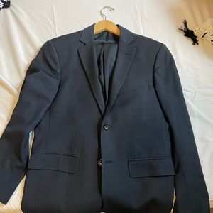 Pronto Uomo navy blue suit. Blazer size 36s; pants size 30 waist.